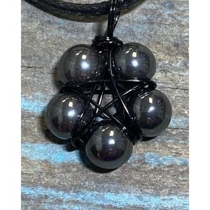 Hematite beads with black copper wire wrapped pentagram necklace